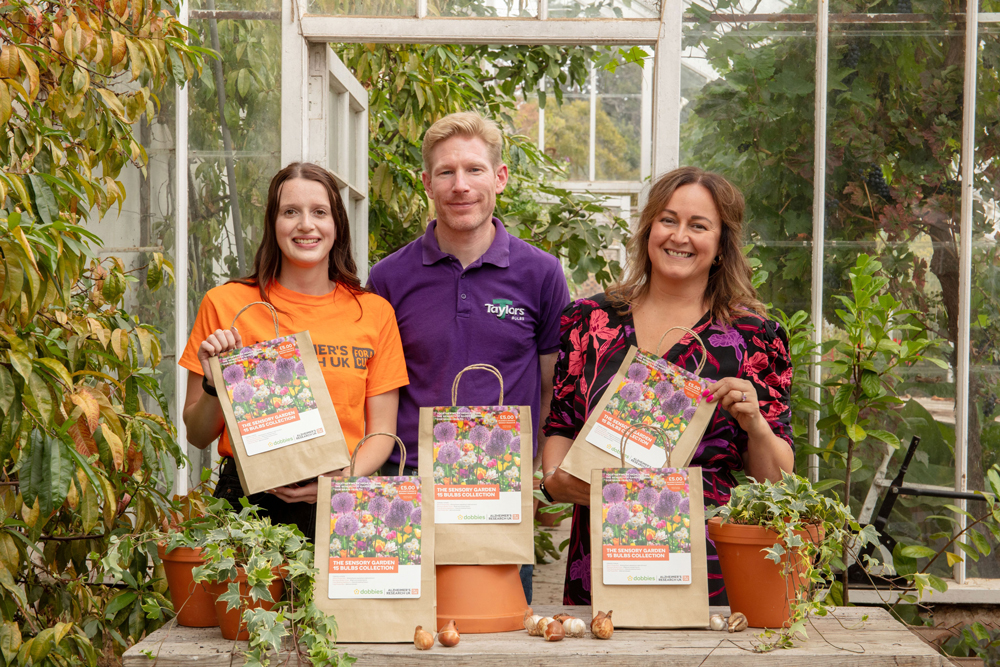 Dobbies’-Senior-Plant-Buyer,-Claire-Bishop,-is-pictured-with-Ian-Clark-from-Taylor’s-Bulbs-and-Catherine-Crawford,-Relationship-Fundraiser-at-Alzheimer’s-Research-UK-(©-Dobbies)