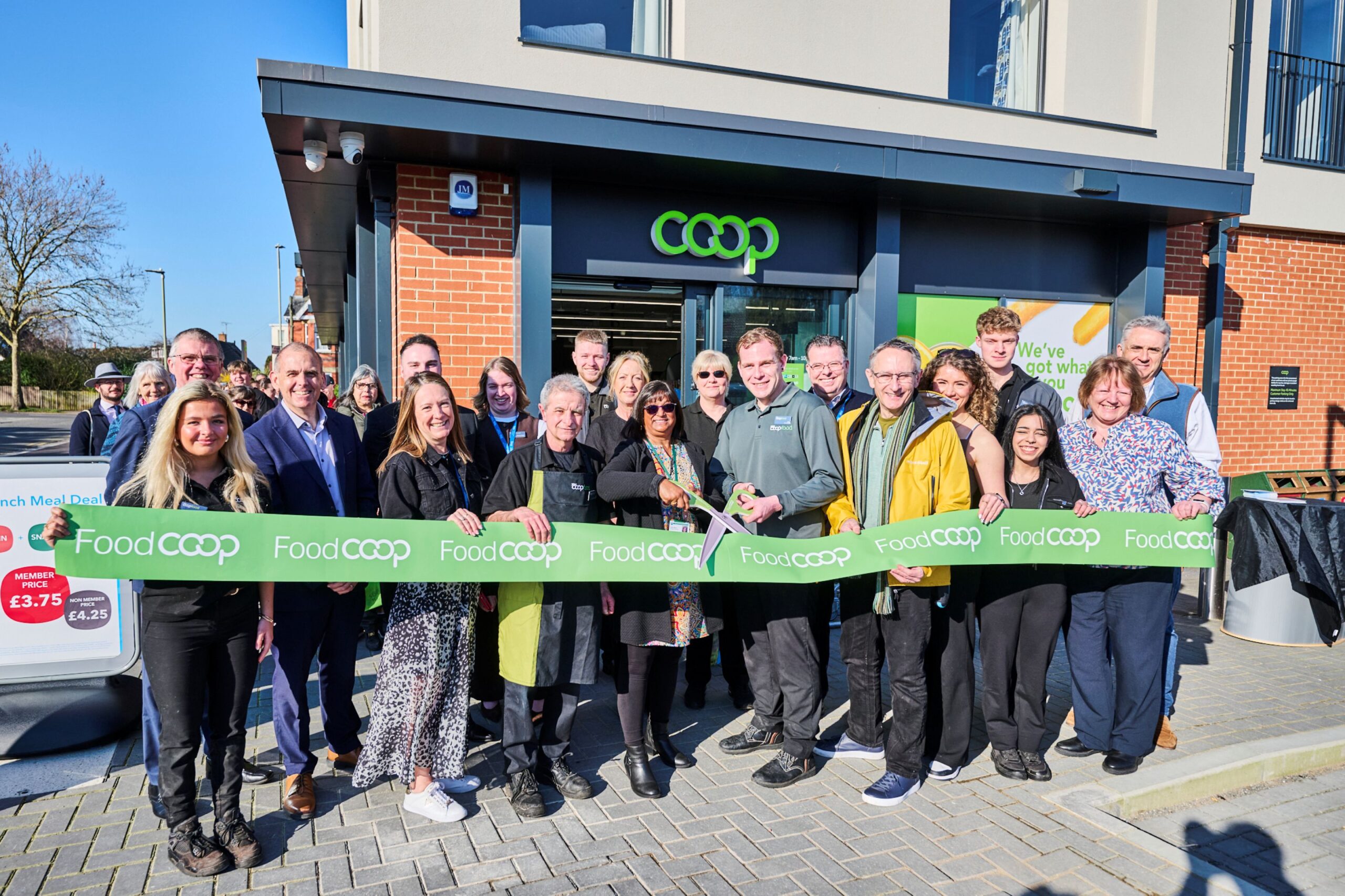 Leckhampton store opening ribbon cutting